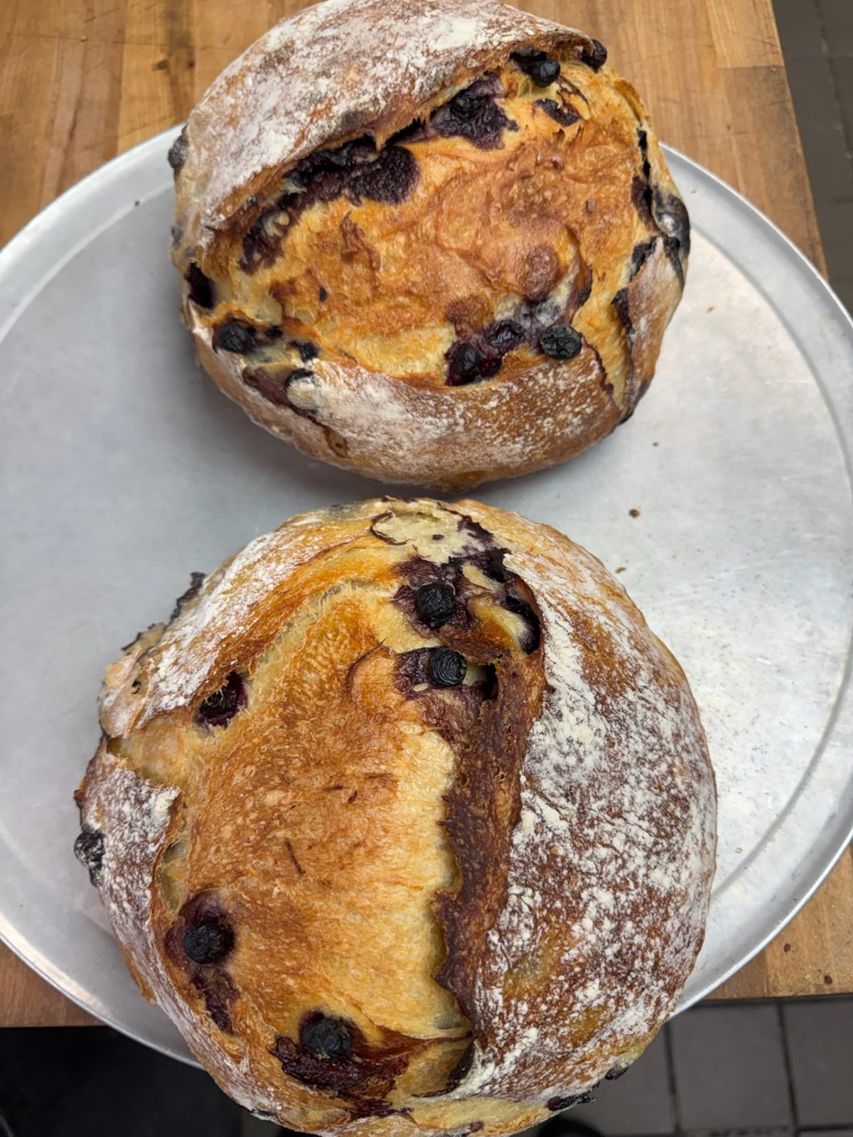 Loaves of fresh baked bread with dried fruit