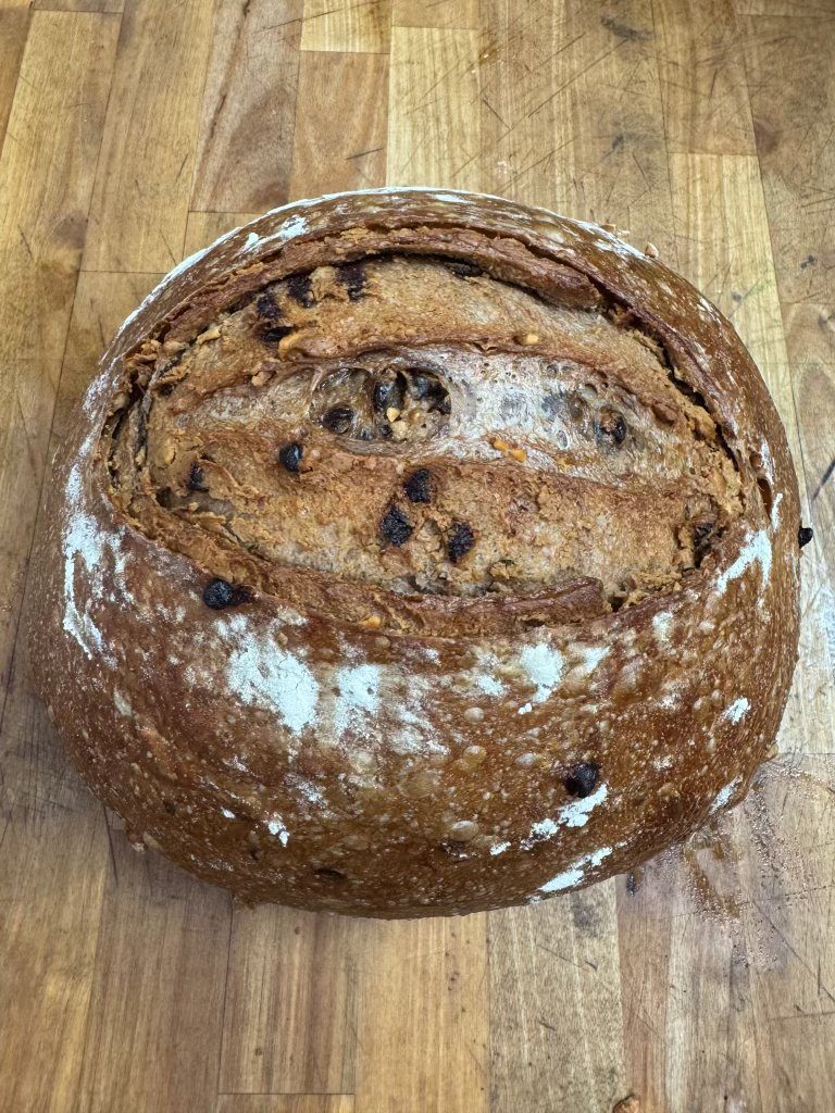 Rustic round loaf on a wooden board